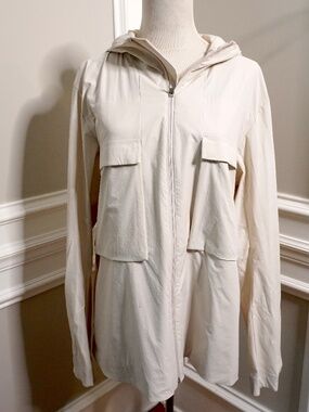 Lululemon Stretch Cargo Full Zip Jacket in a cream color.